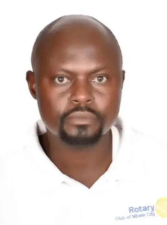 David Mabonga, executive director of the YMCA Mbale Branch in Uganda, in a head-and-shoulders portrait wearing a white shirt