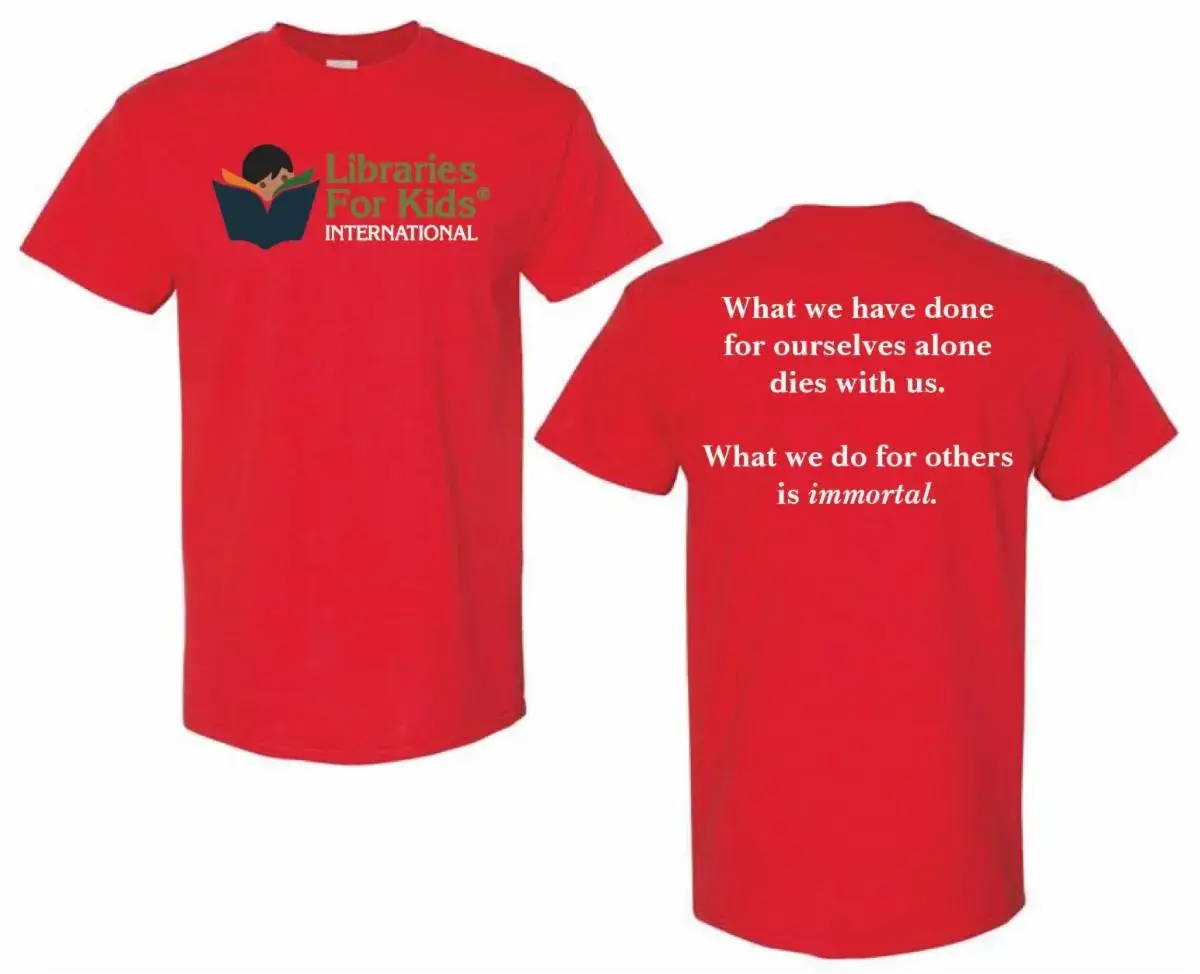 A red T-shirt printed with the Libraries For Kids International logo, front and back, the back carrying a quotation