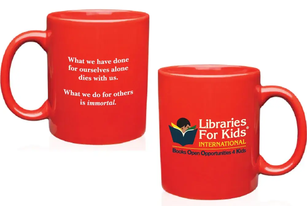 Two red coffee mugs, one printed with a quotation and one with the Libraries For Kids International logo